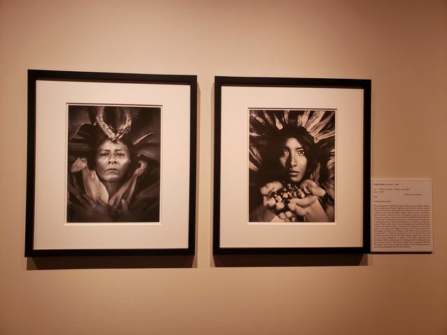 Two photographs by Citlali Fabián feature a mother and daughter dressed in native attire at the “Through Her Lens” exhibit, Tuesday, Sept. 8, 2020, inside The Wittliff Collections. The “Through Her Lens” exhibit showcases the works of 60 women photographers. Tania Zapien 
