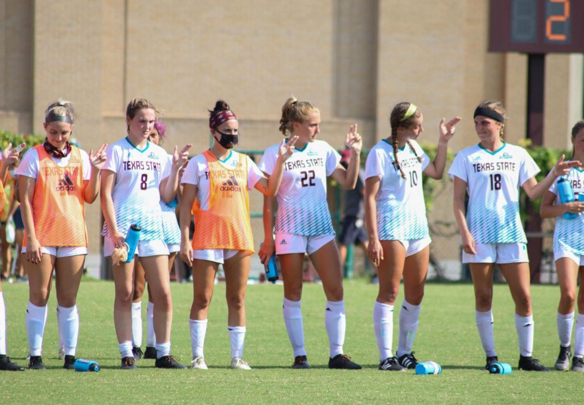Texas State’s soccer team stands in front of the crowd at the conclusion of the game against Abilene Christian, Sunday, Sept. 13, 2020, at the Bobcat Soccer Complex. Texas State lost the match 2-3 in overtime.