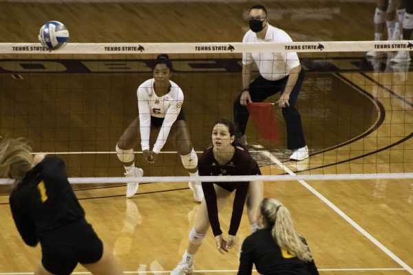 Texas State junior defensive specialist Kayla Granado (6) and sophomore outside hitter Caitlan Buettner (10) anticipate the next hit from the University of Louisiana at Monroe, Friday, Sept. 25, 2020, at Strahan arena. Texas State beat the University of Louisiana at Monroe 3-0.
