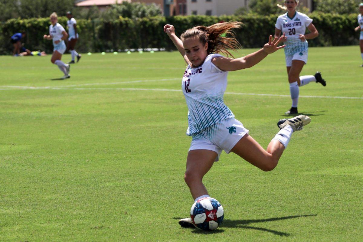 Texas+State+forward+Ally+Kewish+prepares+to+strike+the+ball+to+a+teammate+across+the+field%2C+Sunday%2C+Sept.+15%2C+2019%2C+in+a+game+vs.+McNeese+at+Bobcat+Soccer+Complex.