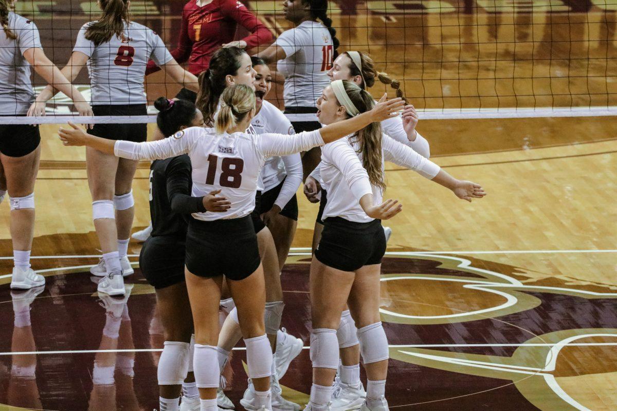 The Bobcats come together while cheering after scoring a point to extend their lead over ULM during the Saturday, Sept. 26, 2020, game at Strahan Arena. The Bobcats won 3-0 over the Warhawks.