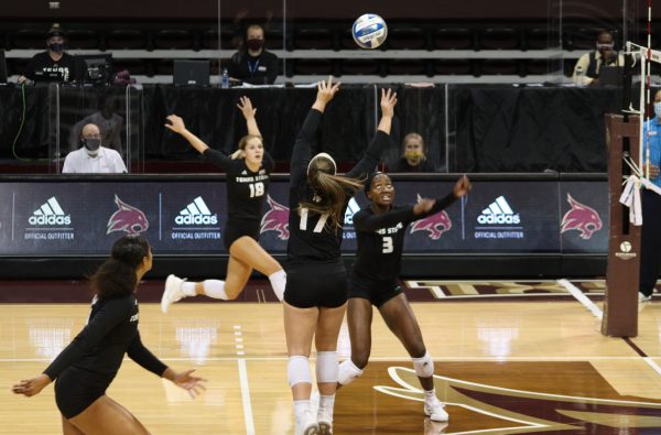Texas State junior setter Emily DeWalt (17) prepares to set the ball for her teammate to spike against the University of Louisiana at Monroe opponents, Friday, Sept. 25, 2020, at Strahan Arena. Texas State won 3-0 against the Warhawks.