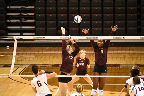 Texas State senior setter Brooke Johnson (12) prepares for the ball to come her way during a game against the University of Arkansas at Little Rock, Friday, Oct. 23, 2020, at Strahan Arena. The Bobcats won 3-0 against the Trojans.