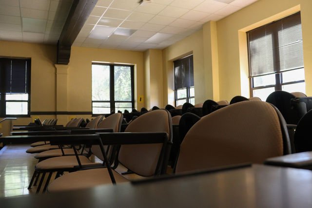 Rows in a classroom sit empty, Tuesday, Sept. 29, 2020, in the Taylor Murphy building. Texas State has reported a total of 529 students cited COVID-19 as a reason for withdrawal from the university.
