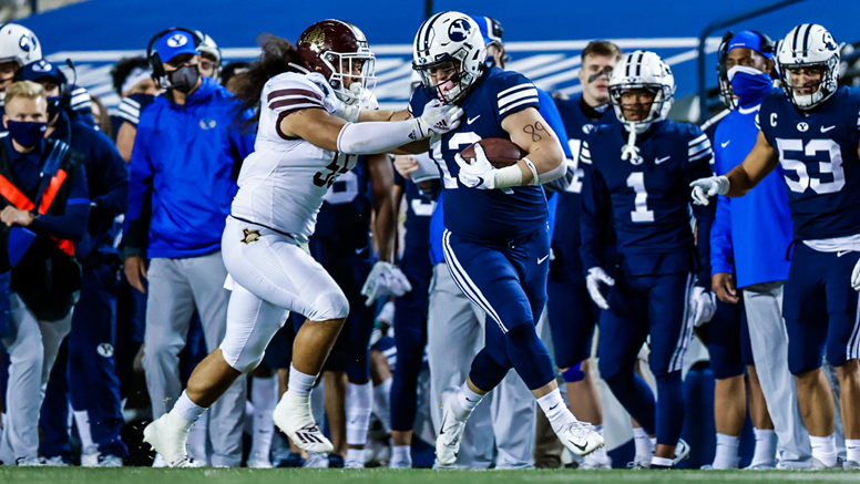 Texas State junior linebacker Sione Tupou attempts to tackle BYU sophomore tight end Masen Wake, Saturday, Oct. 24, 2020, at LaVell Edwards Stadium in Provo, Utah. The Bobcats lost the matchup 14-52. 