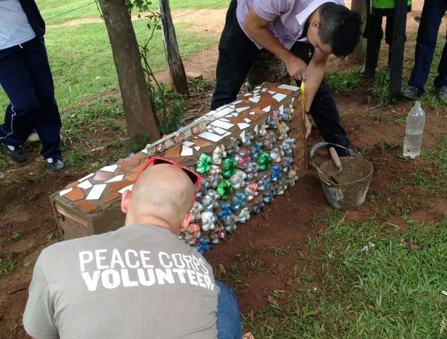 Joshua+Castro+collaborates+with+a+student+in+Paraguay+to+turn+recycled+soda+bottles+into+a+bench.