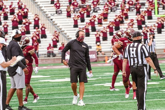 Texas State football Head Coach Jake Spavital walks on the field while wearing a mask in between plays during a game against Southern Methodist University, Saturday, Sept. 5, 2020, at Bobcat Stadium.