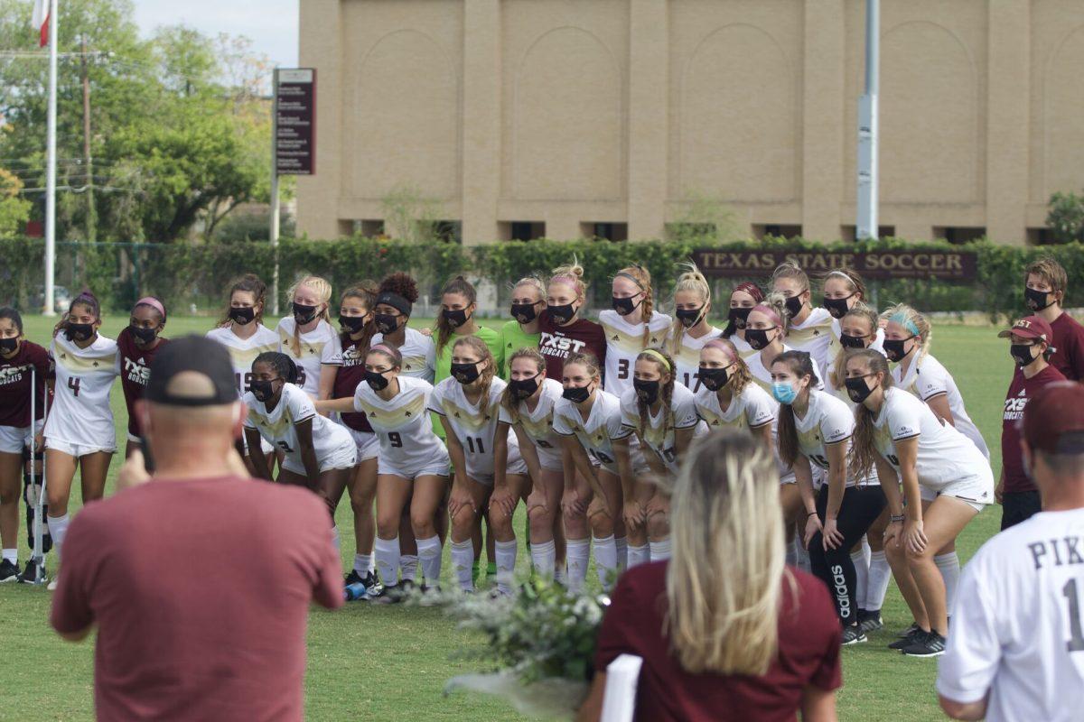 The Texas State womens soccer team poses for a team photo following a 3-1 victory over the University of Louisiana at Monroe, Sunday, Oct. 25, 2020, at the Bobcat Soccer Complex. The photo took place after the teams senior recognition ceremony on Senior Day.
