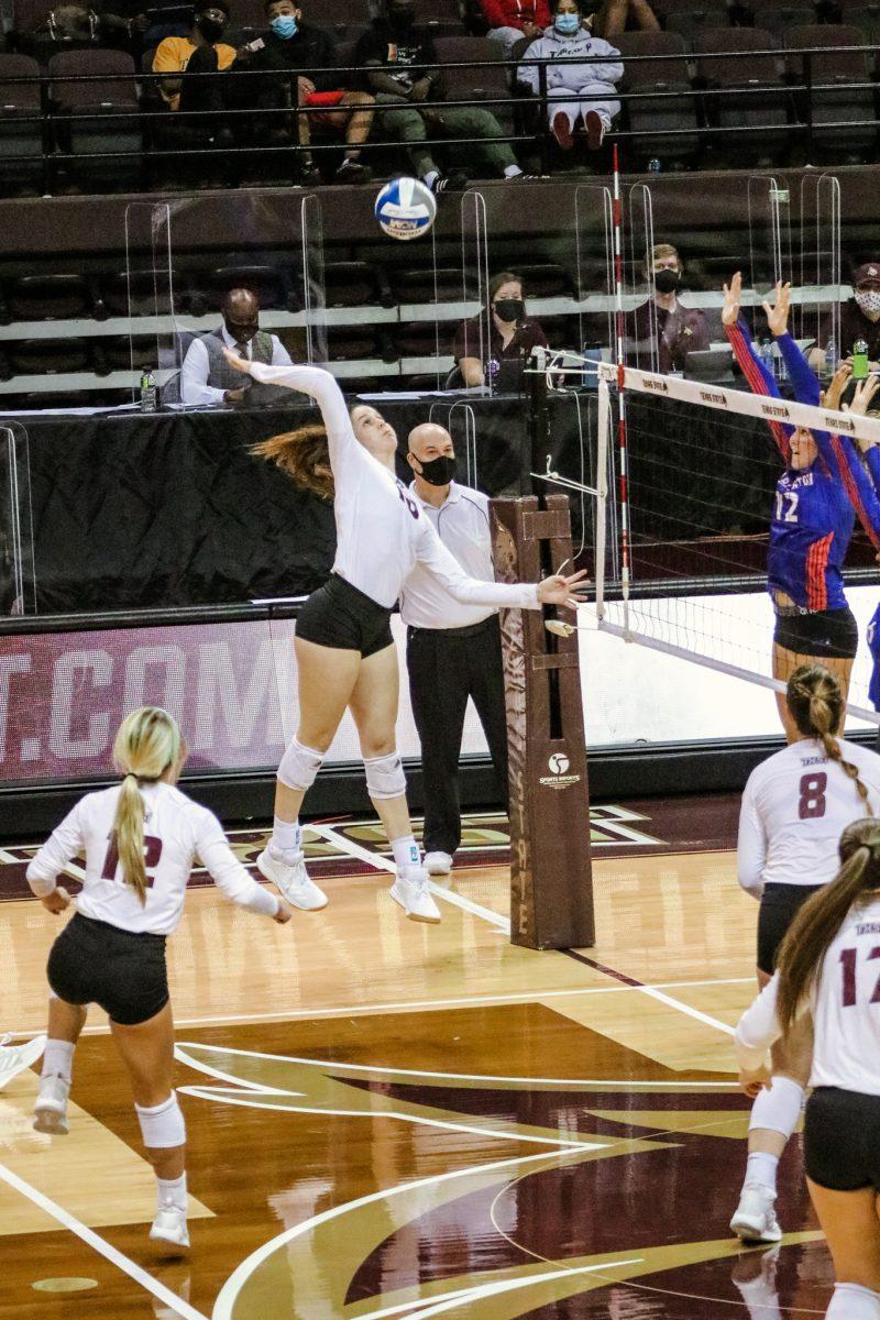 Texas+State+sophomore+outside+hitter+Caitlan+Buettner+%2810%29+approaches+the+ball+to+hit+down+on+the+University+of+Texas+at+Arlington+defense+during+the+second+set+of+the+game%2C+Friday%2C+Nov.+13%2C+2020%2C+at+Strahan+Arena.+The+Bobcats+swept+the+Mavericks+3-0.