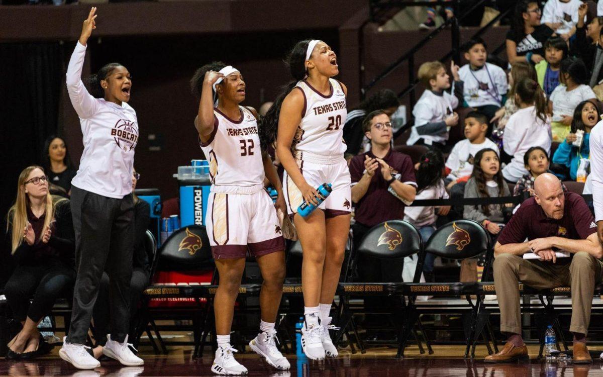 Sophomore forward Da’Nasia Hood and freshman forward Chelsea Johnson celebrate as the Bobcats defeat Georgia Southern in front of 3,300 San Marcos CISD students on Wednesday, Feb. 27, 2020. Photo courtesy of Texas State Athletics.
