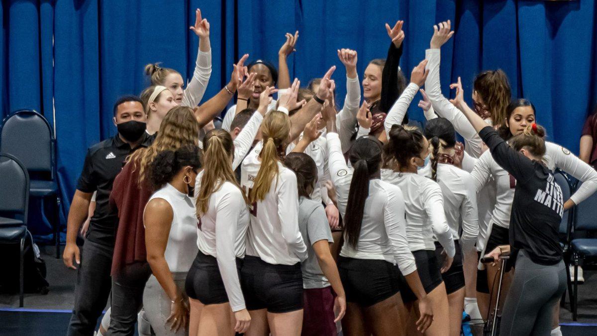 Texas State volleyball celebrates after defeating Troy University 3-1 (25-17, 25-13, 22-25, 25-13) to advance to the Sun Belt Conference Championship.