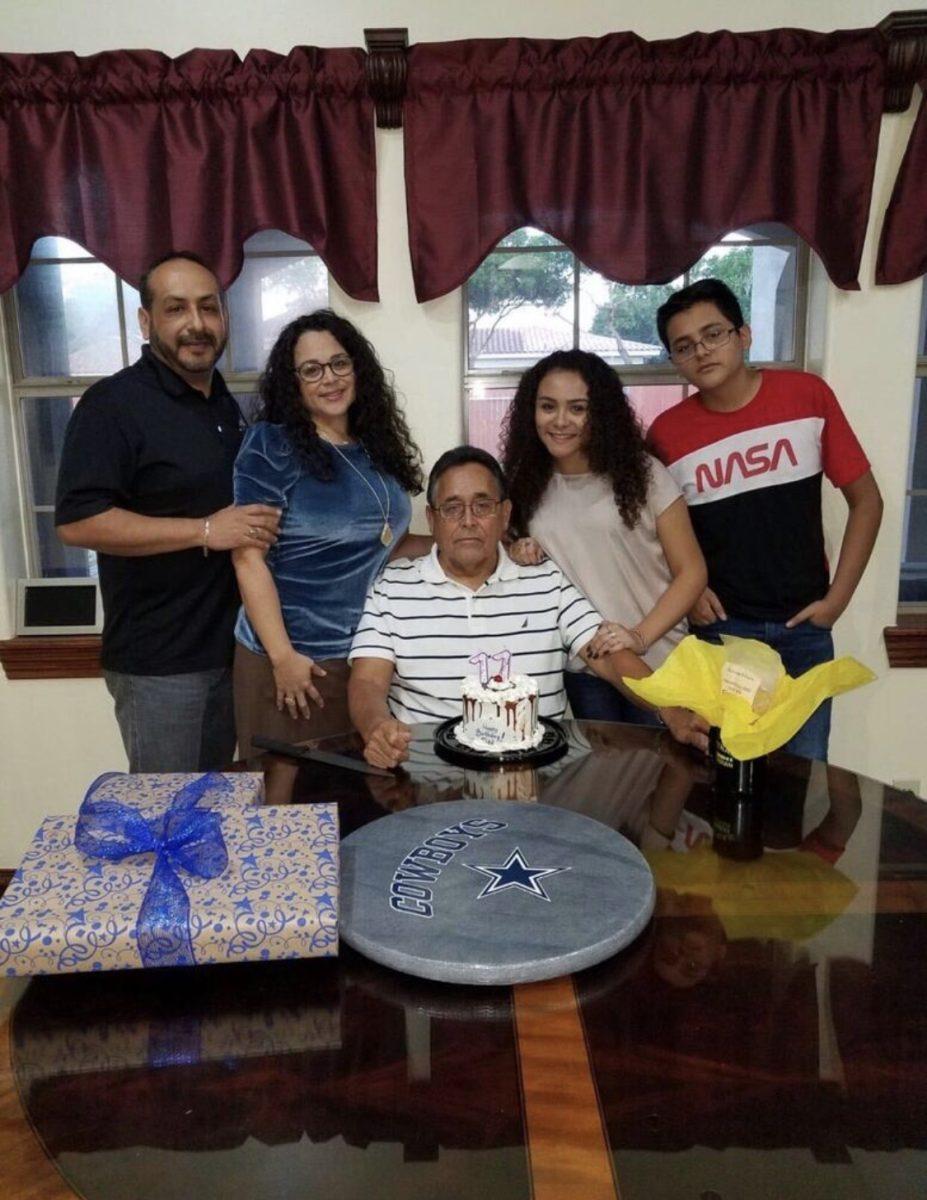 Victoria Vela (second right) smiles with her father, mother and brother at her grandfathers 77th birthday party. Velas father and grandfather died from COVID-19 in 2020. 