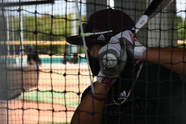 Texas State infielder Connor Anderson (23) prepares to strike a ball in the batting cage, Monday, Oct. 19,  2020, at the Bobcat Ballpark.