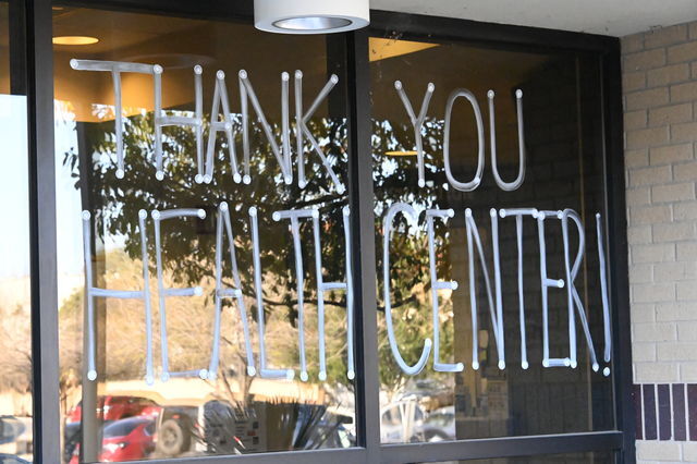 Window art thanking the workers at the Texas State Student Health Center, Thursday, Jan. 14, 2021, at Texas State.