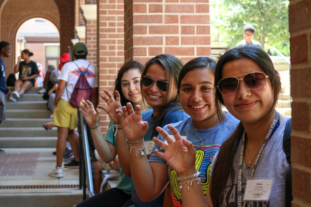 In this file photo, incoming freshmen at the time, Liliana Hernandez (far right), Ilene Espinoza (middle right), Karen Novarro (middle left) and Citlaly Romero (far left) pose for a photo, Wednesday, June 19, 2019, outside of the Undergraduate Academic Center at Texas State. The four students were apart of New Student Orientation Group 23, led by counselors Lola Santos and Christina Gloria.