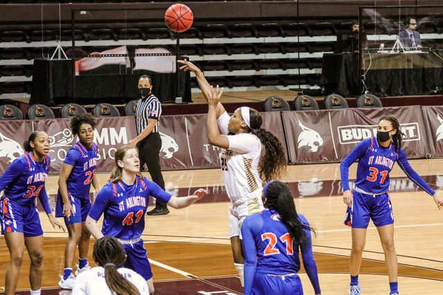 Texas State redshirt sophomore forward Lauryn Thompson (25) takes a shot over the UTA defenders, Friday, Feb. 12, 2021, at Strahan Arena. The Bobcats won 66-45.