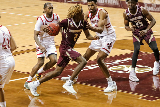 Texas State junior guard Caleb Asberry (2) dribbles the ball to the basket in an attempt to score for the Bobcats during the game against the University of Louisiana at Lafayette, Saturday, Jan. 30, 2021, at Strahan Arena. The Bobcats lost 73-74.