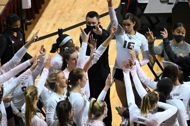 The Bobcats hold up The Heart of Texas State hand sign as a break ends, Thursday, March 25, 2021, at Strahan Arena. The Bobcats won 3-0.