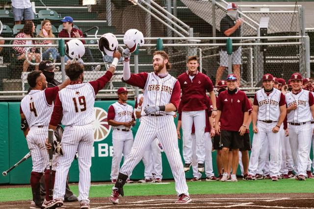 Texas+State+senior+infielder+Cole+Coffey+%2825%29+celebrates+with+his+teammates+after+hitting+his+third+home+run+of+the+night%2C+Saturday%2C+March+13%2C+2021%2C+at+Bobcat+Ballpark.+The+Bobcats+won+15-9.
