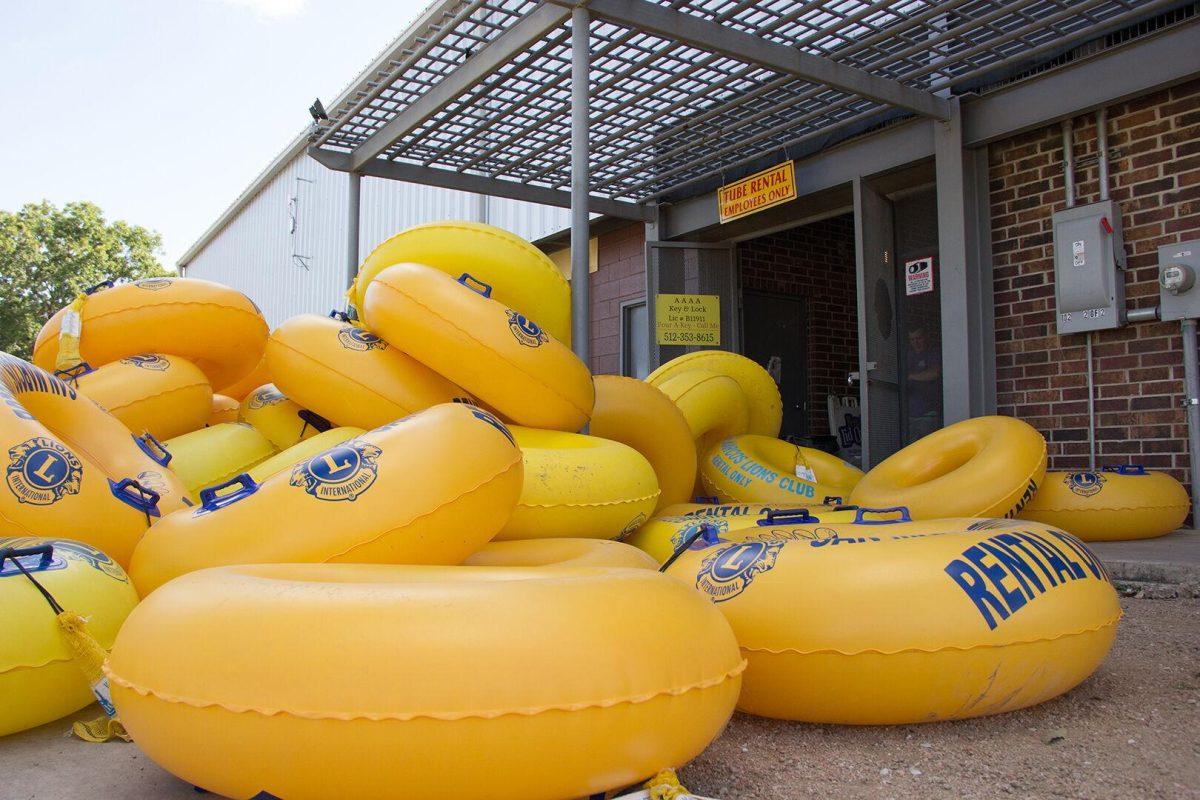 A stack of tubes sit in front of the Lions Club, a local tube rental facility.