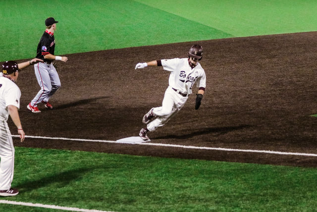 Texas+State+junior+infielder+Dalton+Shuffield+%288%29+sprints+around+the+base+after+his+teammate+hits+the+ball+in+a+game+against+the+University+of+Houston%2C+Friday%2C+March+12%2C+2021%2C+at+Bobcat+Ballpark.+The+Bobcats+lost+12-3.