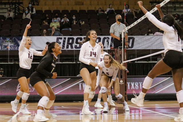 The Bobcats celebrate following a kill from Texas State junior outside hitter Kenedi Rutherford (1) during the second set against TCU, Thursday, March 18, 2021, at Strahan Arena. The Bobcats lost 3-1.