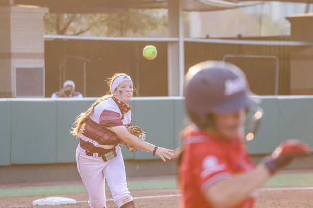 Texas+State+freshman+infielder+Baylee+Lemons+%2824%29+throws+the+ball+to+first+base+in+order+to+get+the+South+Alabama+player+out%2C+Friday%2C+April+9%2C+2021%2C+at+Bobcat+Softball+Stadium.+The+Bobcats+lost+3-1.