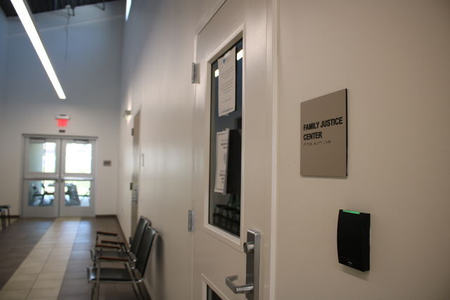 The door and outside sitting area of the Family Justice Center, Monday, April 12, 2021, at the Village Main Campus.