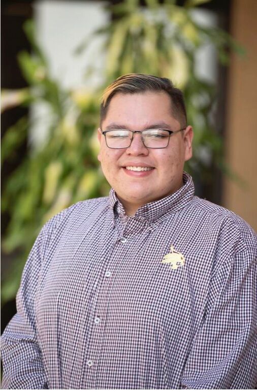 Jamie Saucedo smiles for a headshot photo. Saucedo heard about LGBTeachers through social media and says the organization gave him a community of support with people who shared his anxieties surrounding being an LGBTQ educator.