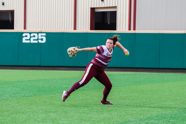 Texas State senior outfielder ArieAnn Bell (19) throws the ball to first base, Wednesday, April 28, 2021, at Bobcat Softball Stadium. The Bobcats won 4-2.
