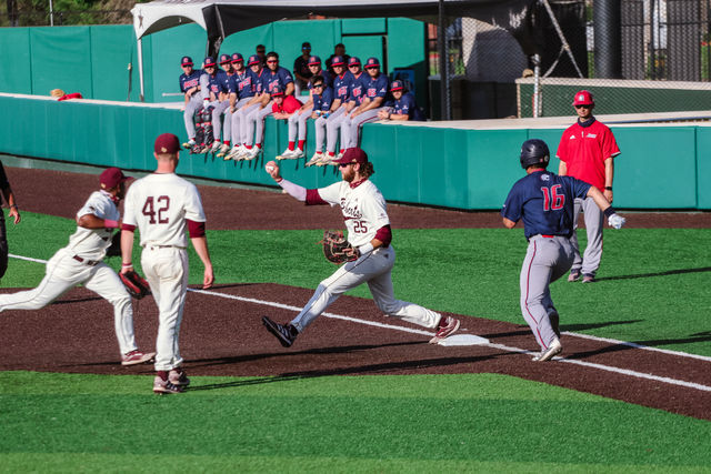 Texas+State+senior+infielder+Cole+Coffey+%2825%29+catches+the+ball+to+get+the+Jaguar+player+out+before+the+player+reaches+first+base%2C+Friday%2C+May+7%2C+2021%2C+at+Bobcat+Ballpark.+The+Bobcats+won+6-3.