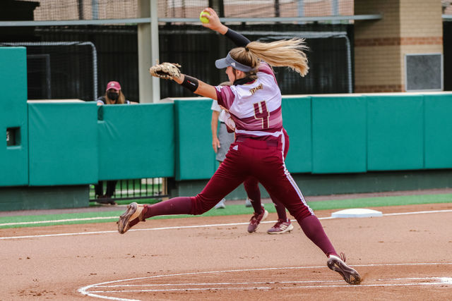 Texas State freshman pitcher Jessica Mullins (4) winds up to pitch to the player at bat during the game against Houston Baptist, Wednesday, April 28, 2021, at Bobcat Softball Stadium. The Bobcats won 4-2.