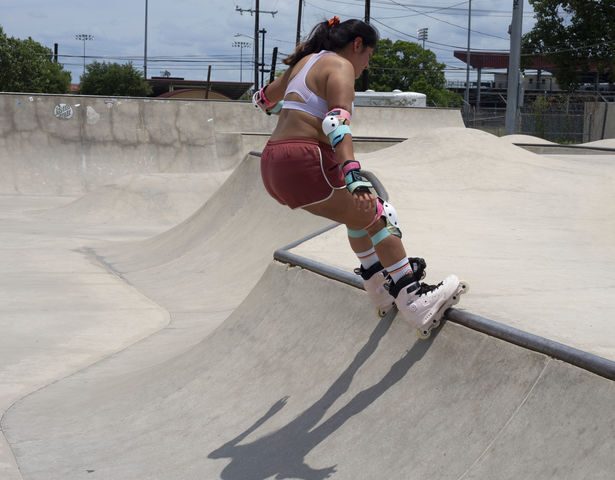 San+Marcos+resident+Amber+Martinez+demonstrates+a+frontside+axle+stall%2C+Sunday%2C+June+20%2C+2021%2C+at+the+San+Marcos+Skate+Park.