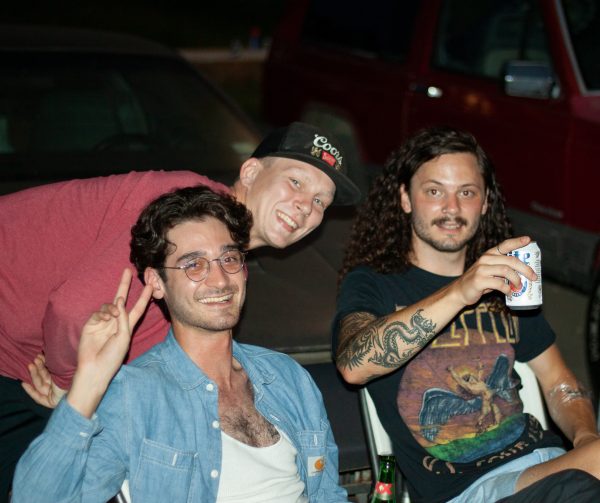 Premier attendees (from left to right) Jeremy Biggs, Josh Farrell and Seth Norris sit and watch others skate, Saturday, June 12, 2021, in San Marcos.