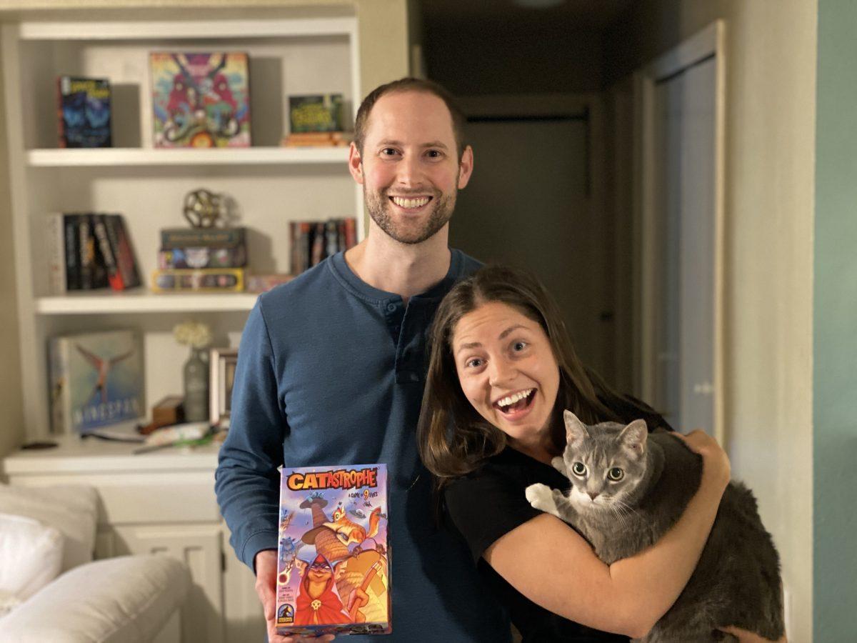 Josh+and+Abi+Norris+smile+with+their+cat+named+Indie+as+they+celebrate+the+launch+of+CATastrophes+Kickstarter%2C+Tuesday%2C+May+4%2C+2021.