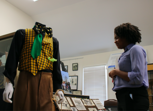 Texas State criminal justice graduate Seneca Green looks around the exhibit, Saturday, June 19, 2021, at Calaboose African American History Museum.