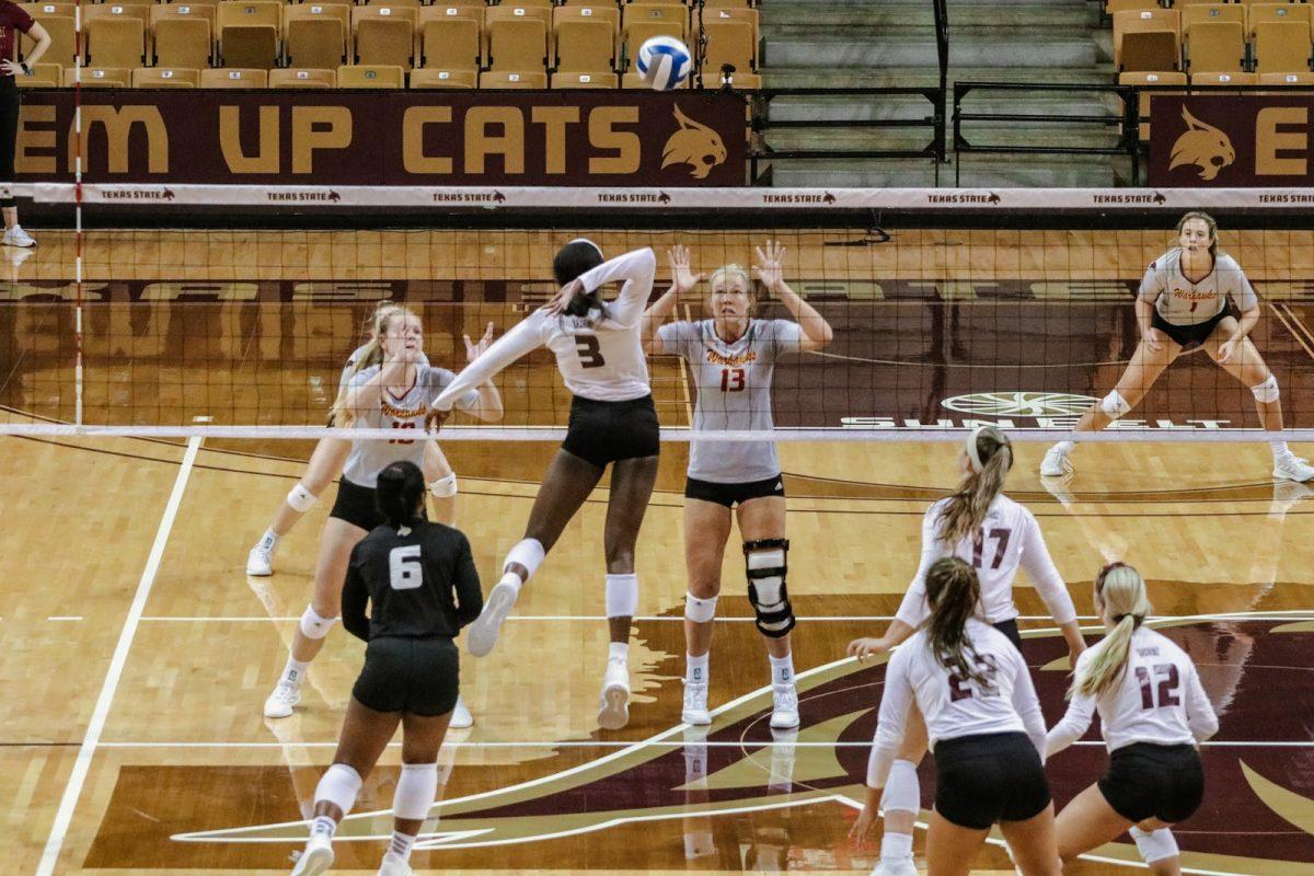Texas State middle blocker Tyeranee Scott (3) approaches to hit the volleyball to the University of Louisiana Monroe defense, Friday, Sept. 25, 2020, at Strahan Arena. The Bobcats won 3-0.