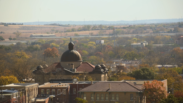 The Hays County Historic Courthouse stands over the city, Thursday, Dec. 10, 2020, in San Marcos.