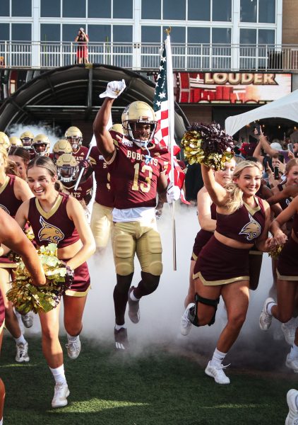 Texas State sophomore safety DeJordan Mask (13) runs out to the field following the cheerleaders before the start of the game against Baylor, Saturday, Sept. 4, 2021, at Bobcat Stadium. The Bobcats lost 29-20.