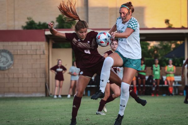 Texas State sophomore midfielder Mya Ulloa (8) battles against a Coastal Carolina player for possession of the ball, Thursday, Sept. 16, 2021, at Bobcat Soccer Complex. The Bobcats won 2-1 in overtime.