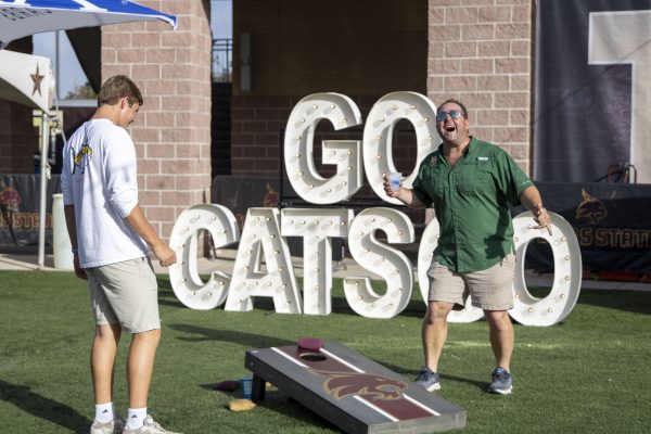 Texas State and Baylor fans play tailgate games at Katzegarten before kickoff of the football game, Saturday, Sept. 4, 2021, at Bobcat Stadium.