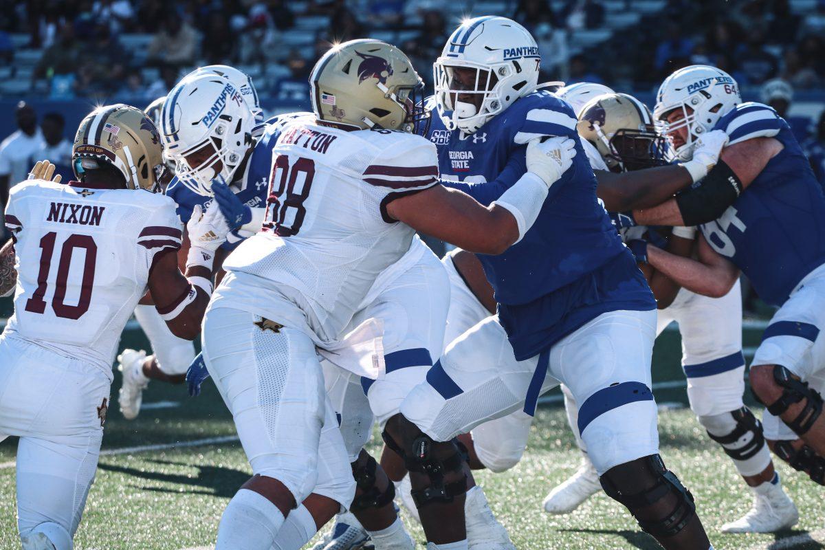Texas State senior defensive lineman Caeveon Patton (88) pushes back a Georgia State player during the third quarter of the game, Saturday, Oct. 23, 2021, at Center Parc Stadium. The Bobcats lost 16-28.