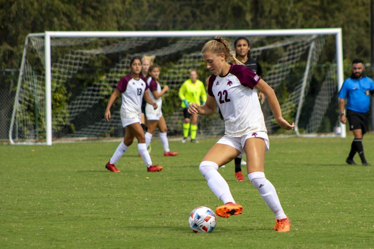 Texas State senior defender Addison Gaetano (22) dribbles the ball downfield, Sunday, Oct. 3, 2021, at Bobcat Soccer Complex. Texas State defeated the Little Rock Trojans 2-1.