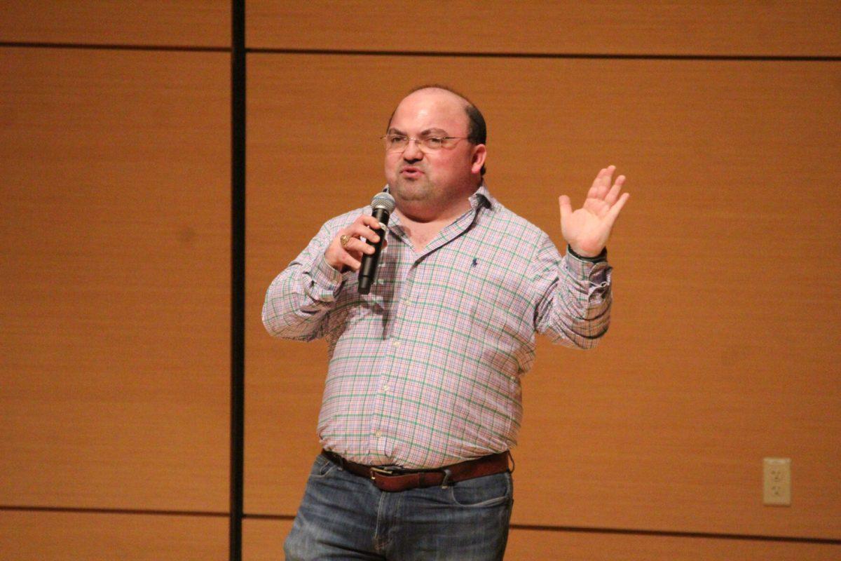 Daniel West, a developmental education graduate student, speaks to audience members during The University Star's 