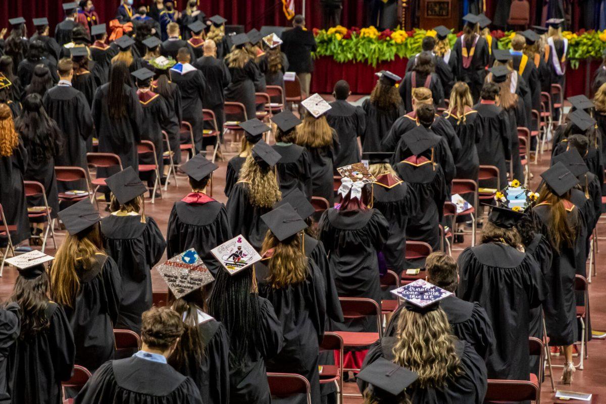 Texas+State+Fall+2021+graduates+stand+before+the+start+of+the+commencement+ceremony%2C+Saturday%2C+Dec.+11%2C+2021%2C+at+Strahan+Arena.