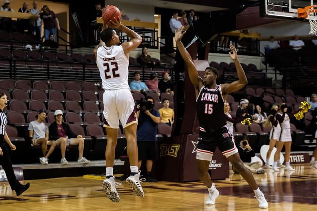 Texas State senior forward Nighael Ceaser (22) pulls up for a shot during a game against Lamar University, Wednesday, Dec. 15, 2021, at Strahan Arena. The Bobcats won 67-47.