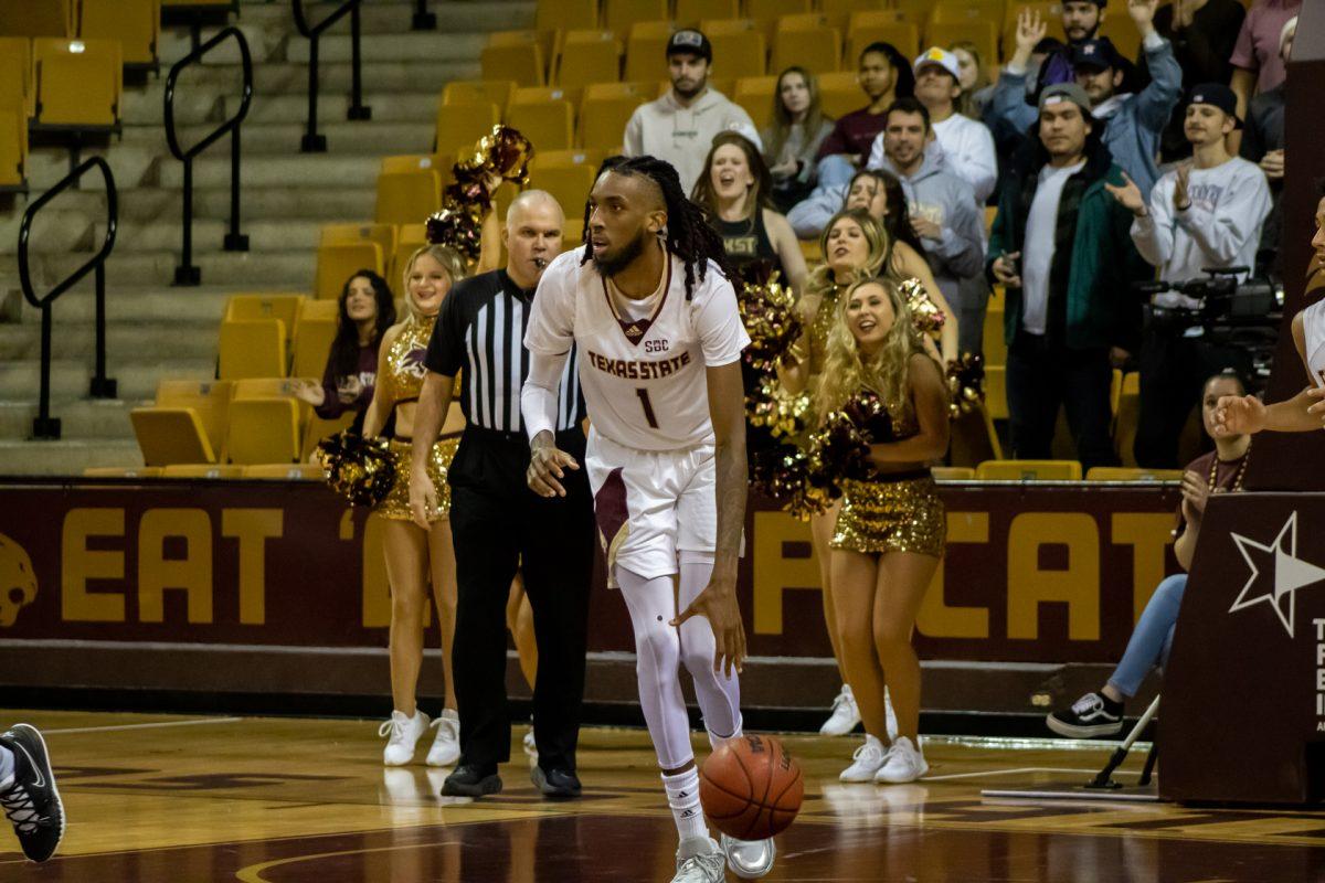Texas State senior forward Isiah Small (1) dribbles up court during a game against Appalachian State, Thursday, Feb. 3, 2022, at Strahan Arena. The Bobcats won 68-66.