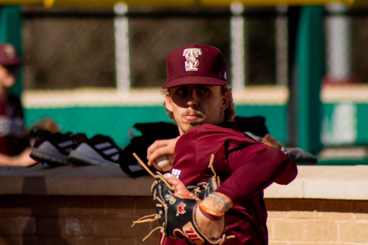 Texas+State+sophomore+pitcher+Otto+Wofford+%2827%29+practices+his+pitching+during+baseball+practice%2C+Wednesday%2C+Feb.+9%2C+2022%2C+at+Bobcat+Ballpark.