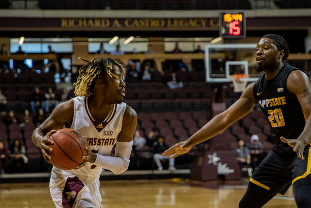 Texas State senior guard Caleb Asberry (5) looks for an open teammate to pass the ball to during a game against Appalachian State, Thursday, Feb. 3, 2022, at Strahan Arena. The Bobcats won 68-66.