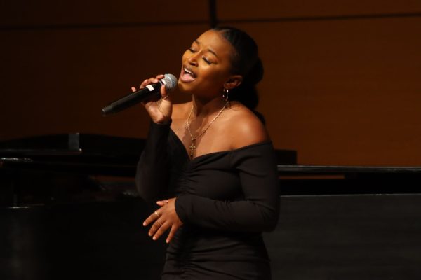 Texas State exercise and sports science junior Shanya Manadier sings during the 38th Annual MLK Commemoration Celebration, Wednesday, Feb. 23, 2022, at the Performing Arts Center Recital Hall. Hosted by the Office of Institutional Inclusive Excellence - Student Initiatives (IIE-SI), the event was originally planned for Jan. 18 but was postponed to prevent the spread of COVID-19.